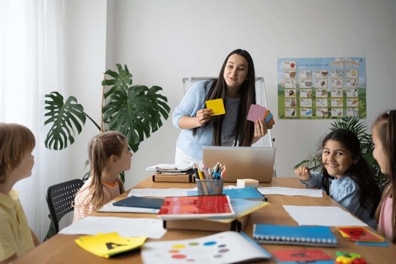 Teacher encouraging students in classroom